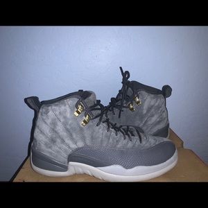 Dark grey Jordan 12’s